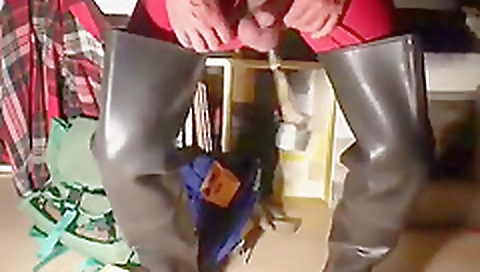 Mature woman with a dildo fucks her pussy