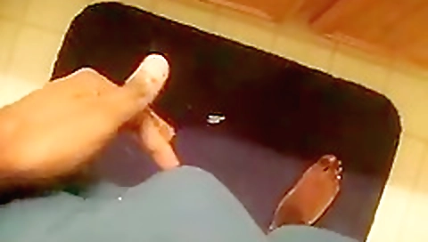 Sexy young chick does her pussy