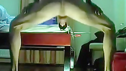 Sexy blonde model shows off her ass in the park