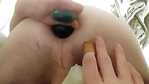 Toy sidewayskime and two guys get it on the beach